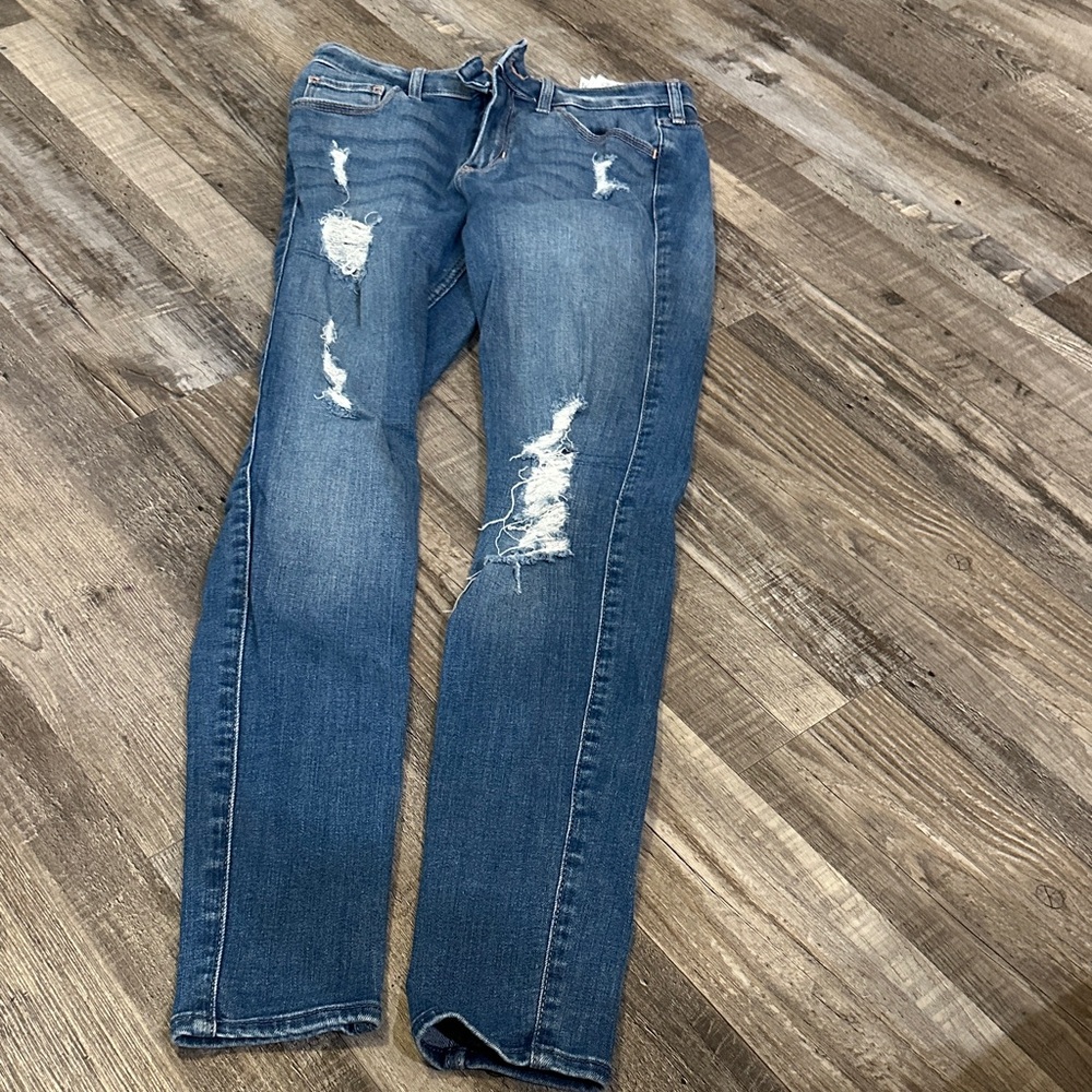 Distressed Blue Jeans